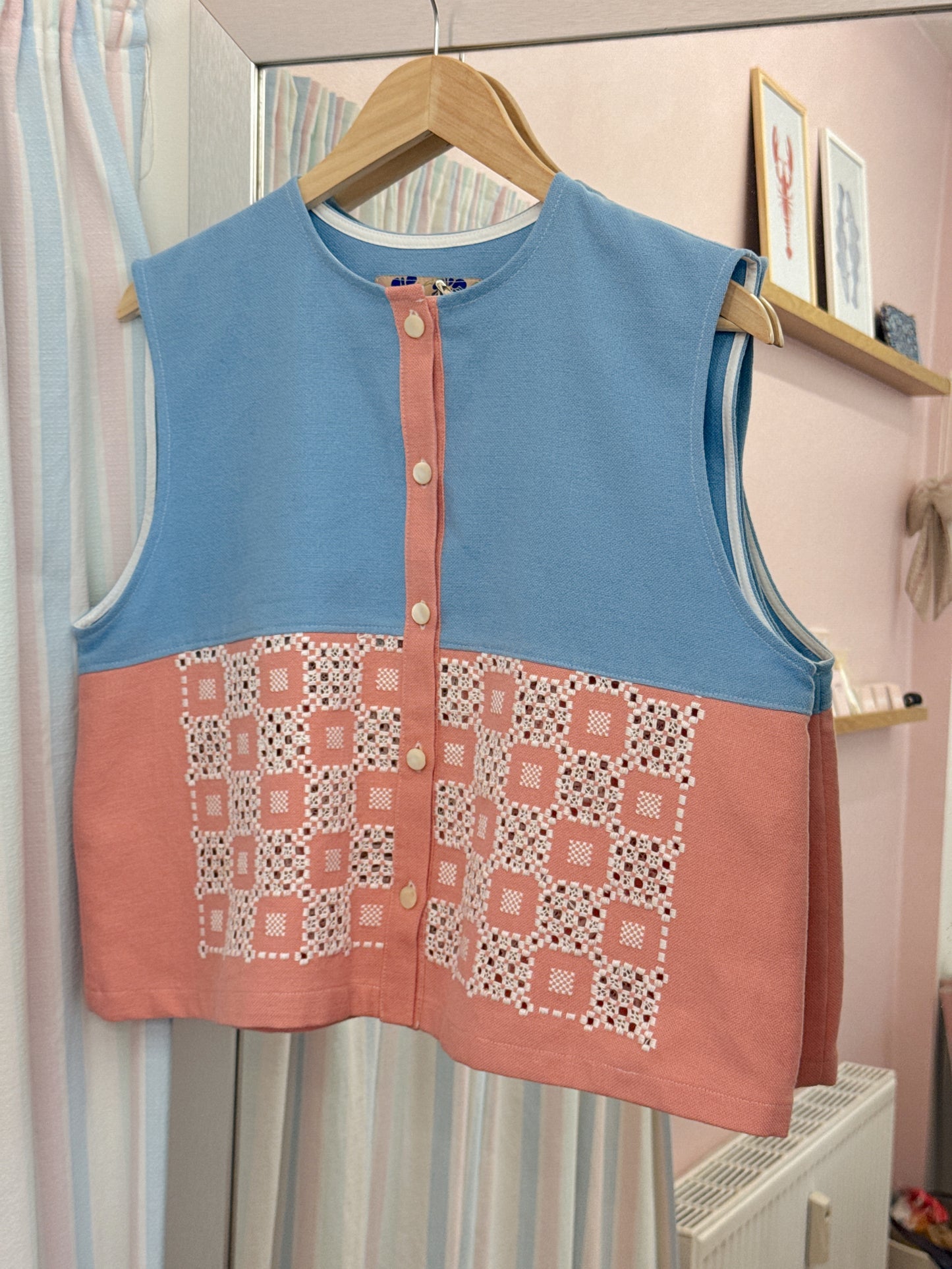 Vest med knapper