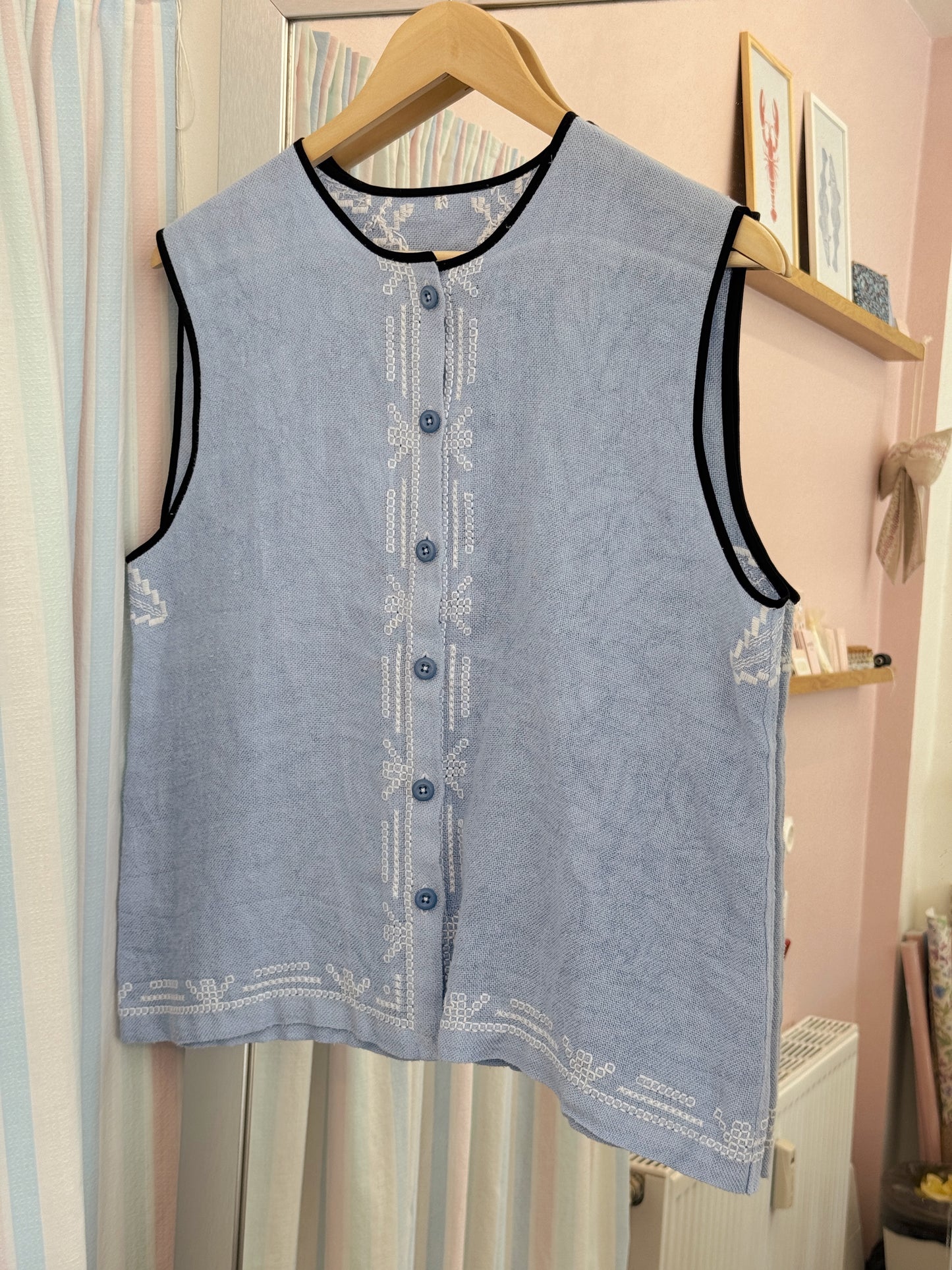 Vest med knapper