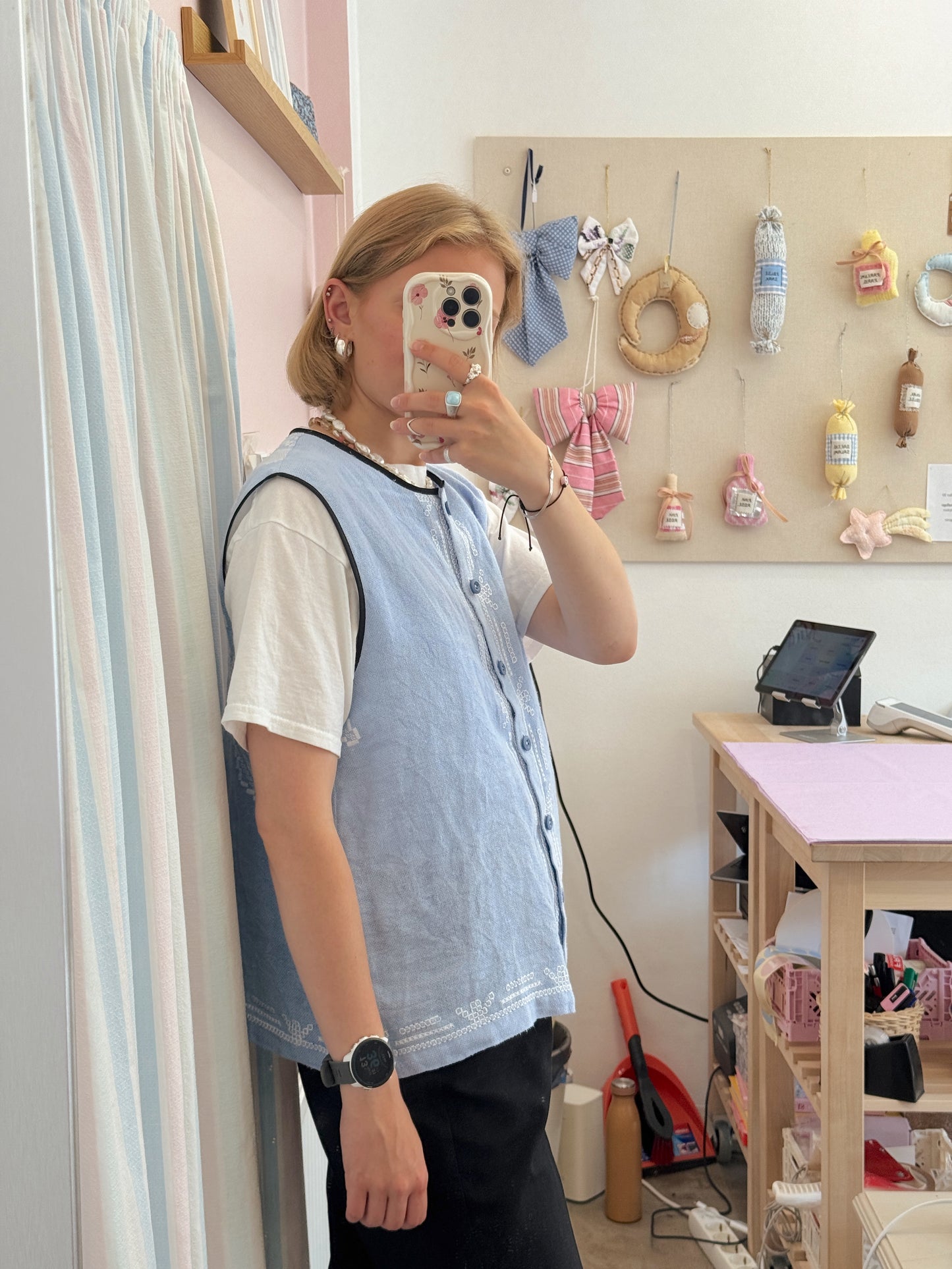Vest med knapper