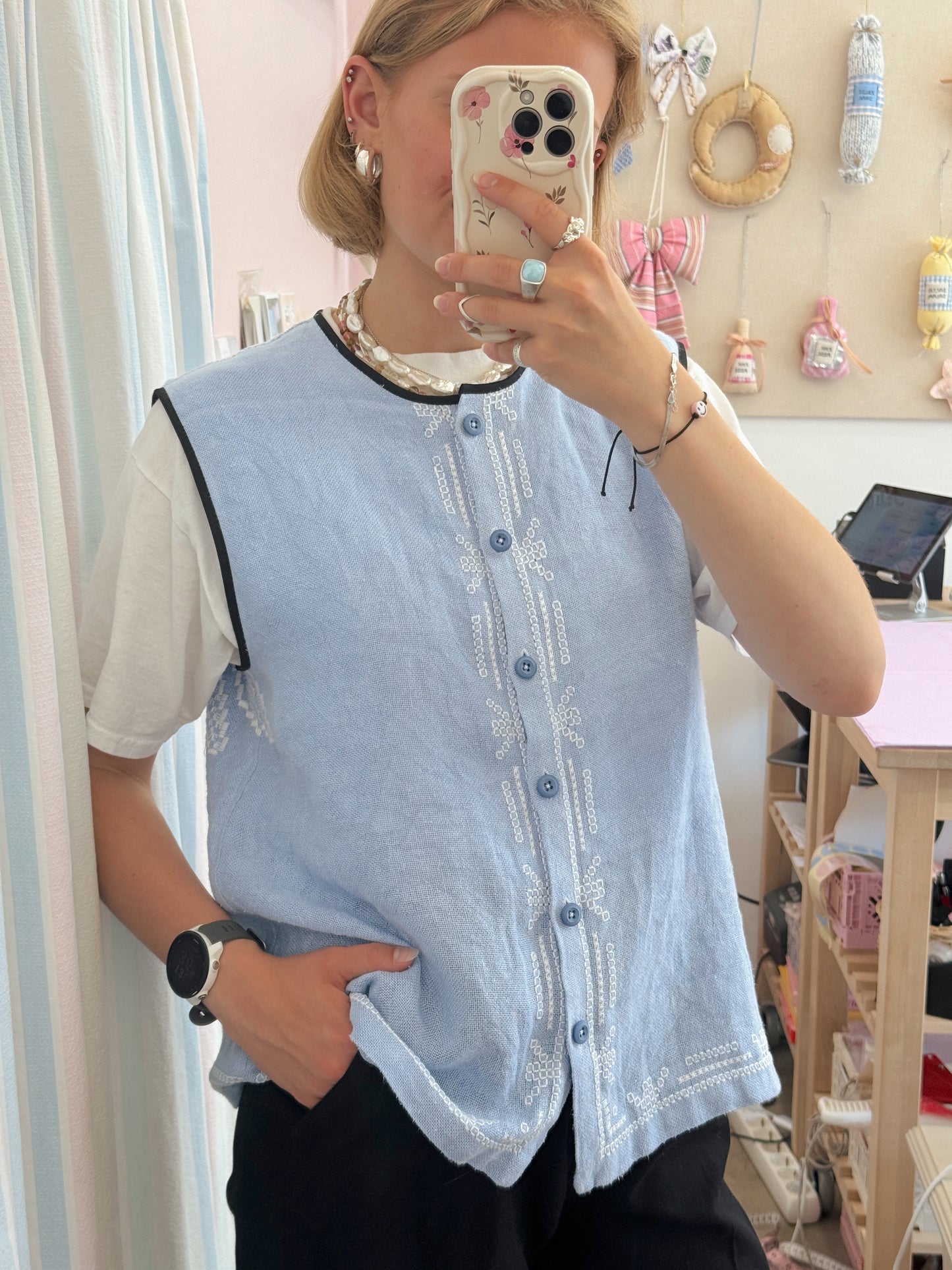 Vest med knapper
