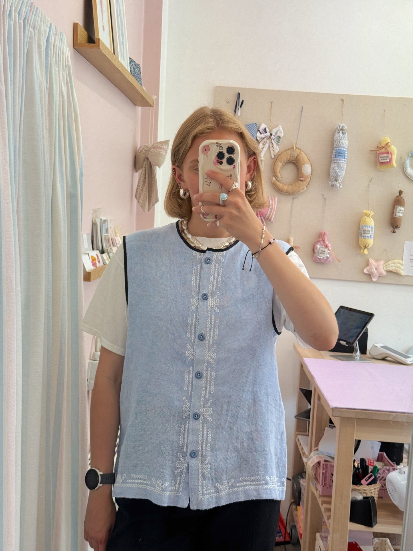 Vest med knapper