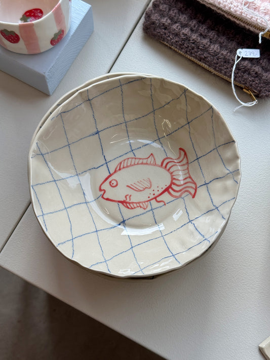 Skål med fisk
