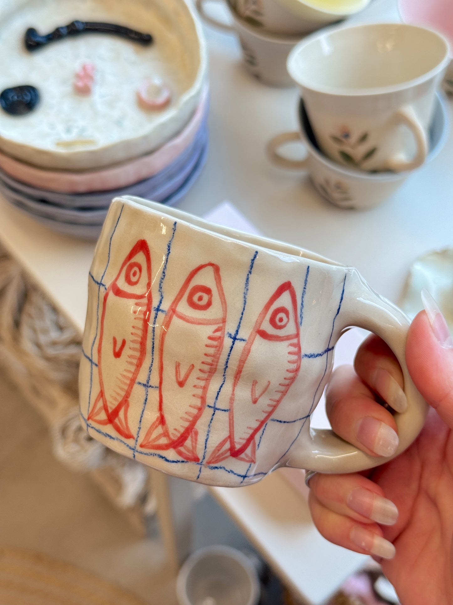 Kop med fisk | Med hank