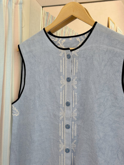 Vest med knapper