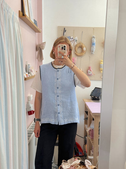 Vest med knapper